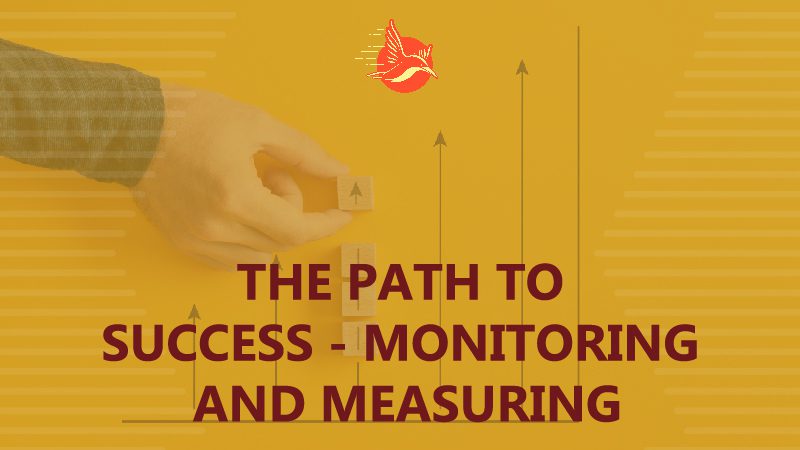 Diagram with upward arrows, one being uplifted by a hand, symbolizing success monitoring