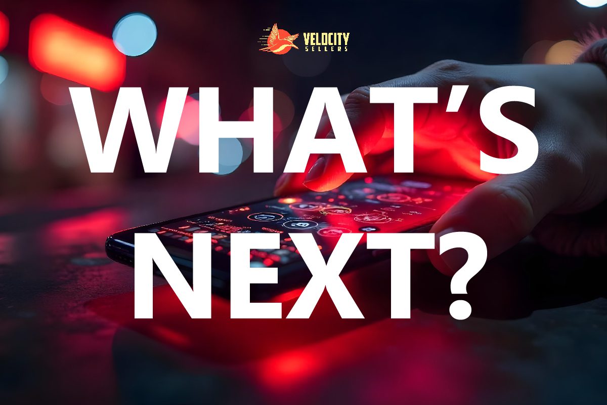 A hand interacting with a smartphone interface glowing in red, with the words "What’s Next?" and the Velocity Sellers logo.