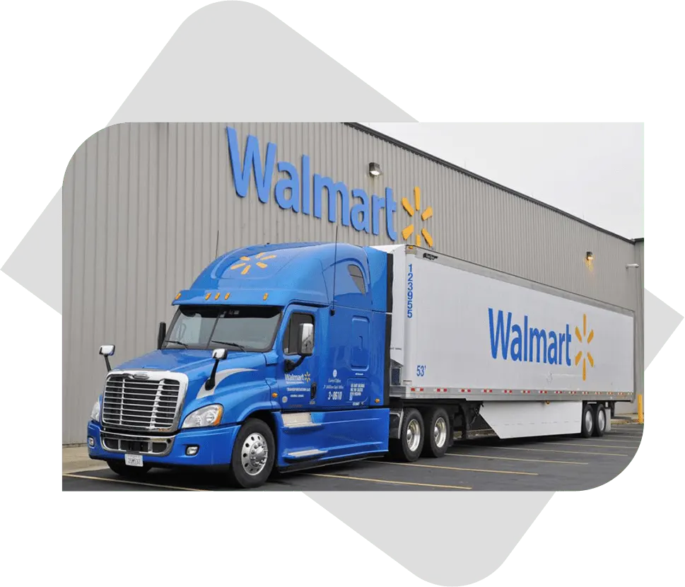 A Walmart-branded semi-truck parked outside a Walmart facility