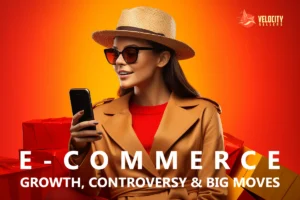 Stylish woman in sunglasses and a hat shopping on her phone, surrounded by vibrant gift boxes, symbolizing the excitement and evolution of e-commerce-growth.
